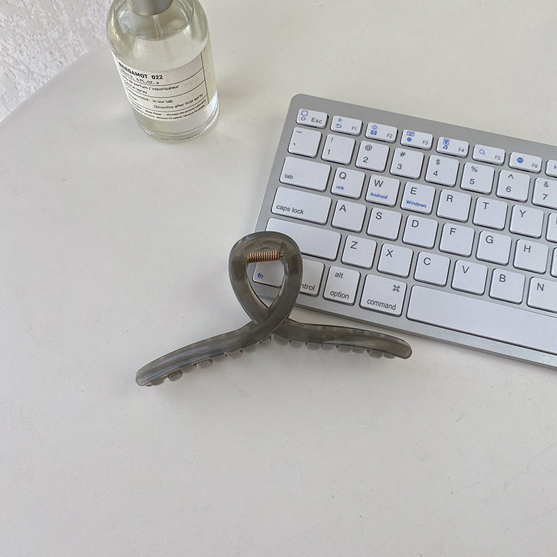Vintage Curve Hair Claw – Chic & Strong Hold MERLIÁ