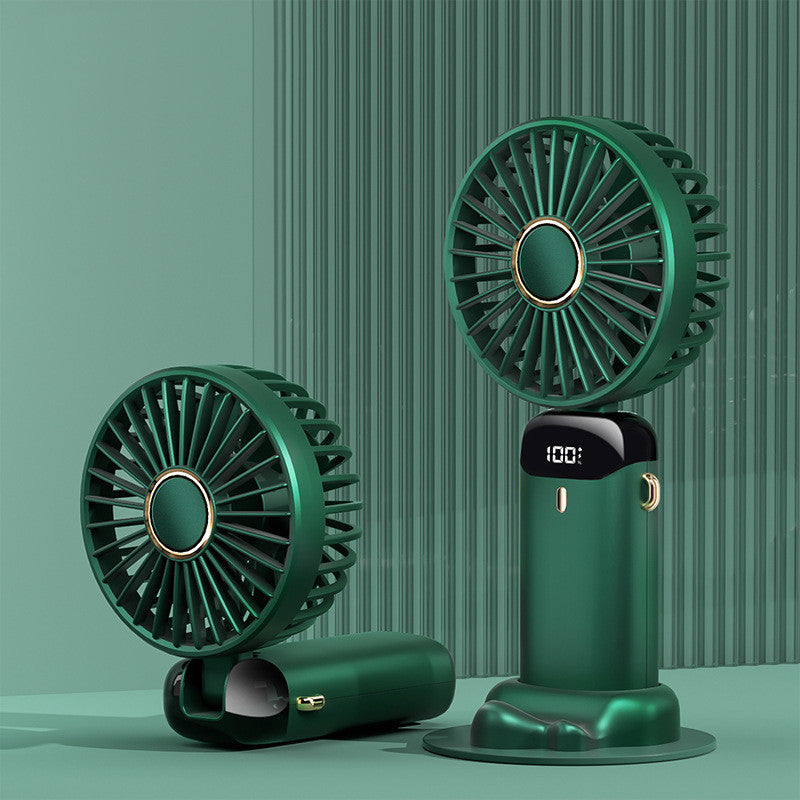Portable USB rechargeable mini handheld and neck fan in green, highlighting lightweight 3-in-1 design for handheld, desk, or neck use.