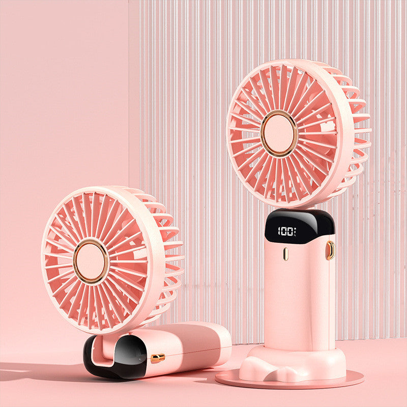 Portable USB rechargeable mini handheld and neck fan in pink, showing versatile 3-in-1 use for outdoor, travel, and desk cooling.