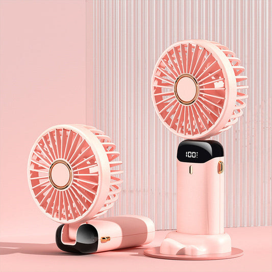 Portable USB rechargeable mini handheld and neck fan in pink, showing versatile 3-in-1 use for outdoor, travel, and desk cooling.