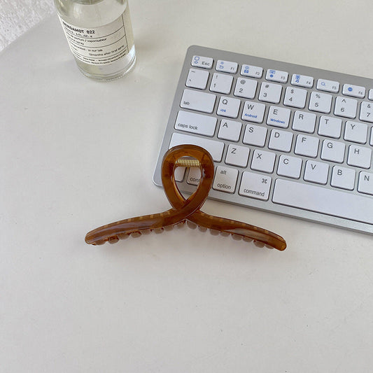 Vintage Curve Hair Claw – Chic & Strong Hold MERLIÁ